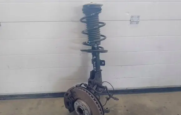 Front wheel hub spindle knuckle