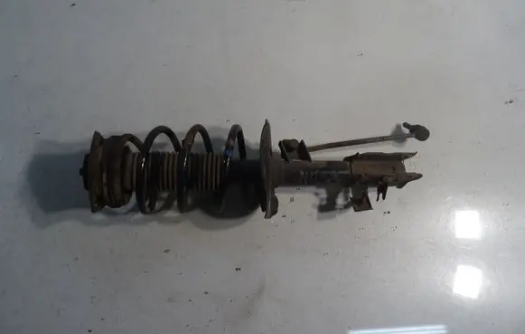 Nissan Qashqai+2 Front shock absorber with coil spring