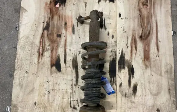 Subaru Legacy Rear shock absorber with coil spring 