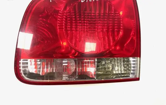 Volkswagen Touareg I Tailgate rear/tail lights 7L6945094J