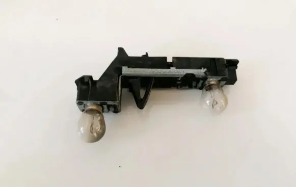 Volvo 850 Tail light bulb cover holder det3512416