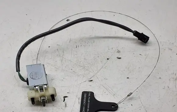 Fuel tank cap lock motor