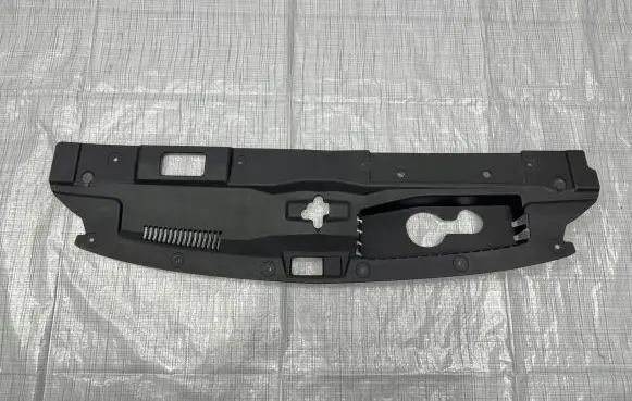 Engine bonnet/hood lock trim molding