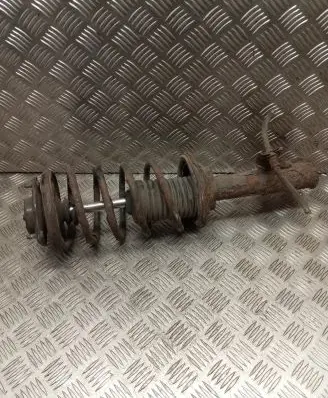 Nissan Almera Front shock absorber with coil spring