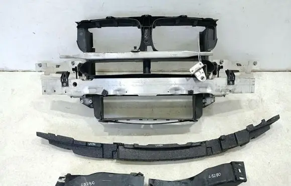 Radiator support slam panel