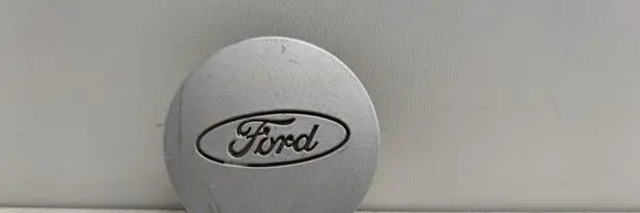 Ford Escort Original wheel cap 86AB1000AA