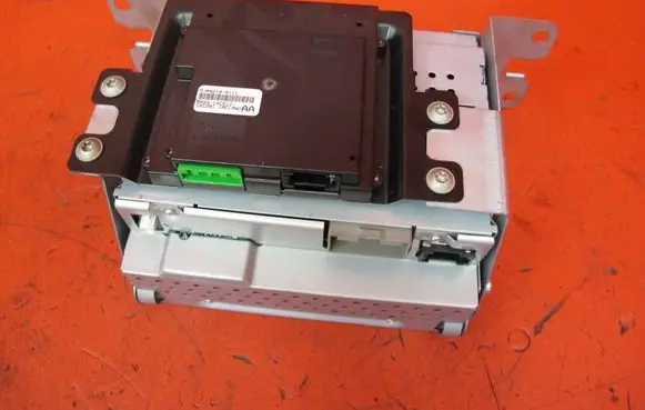 Jaguar XF X250 CD/DVD changer 7G9N-18C815-TB 8X23-14C512-AA