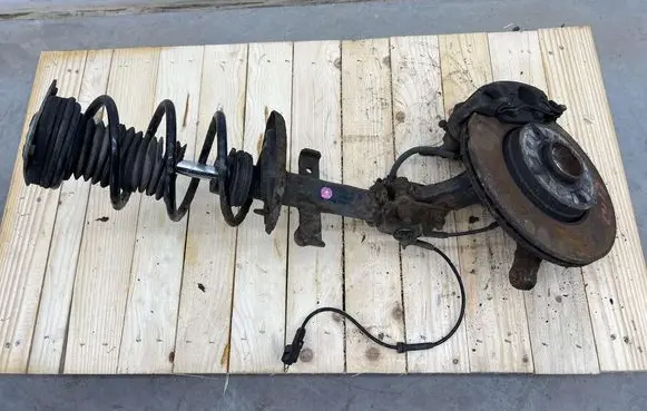 Renault Clio IV Front shock absorber with coil spring