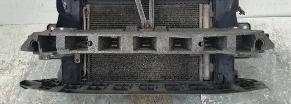 Radiator support slam panel