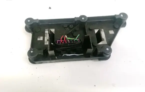 Tail light bulb cover holder