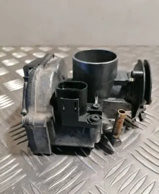 Volkswagen Golf IV Throttle valve 703703020 030133064F