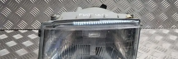 Fiat Uno Headlight/headlamp 60944210 60944770