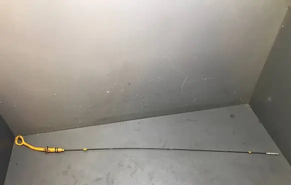 Oil level dip stick