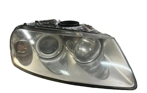 Volkswagen Touareg I Headlight/headlamp 7L6941016CE 89307881