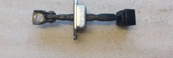Mitsubishi Outlander Front door check strap stopper