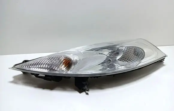 Nissan Juke I F15 Headlight/headlamp