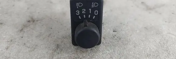 Headlight level height control switch