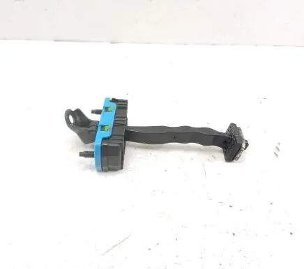 Front door check strap stopper