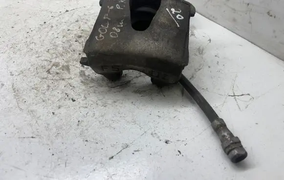 Volkswagen Golf VI Front brake caliper