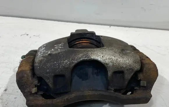 Chrysler Voyager Front brake caliper 16018401