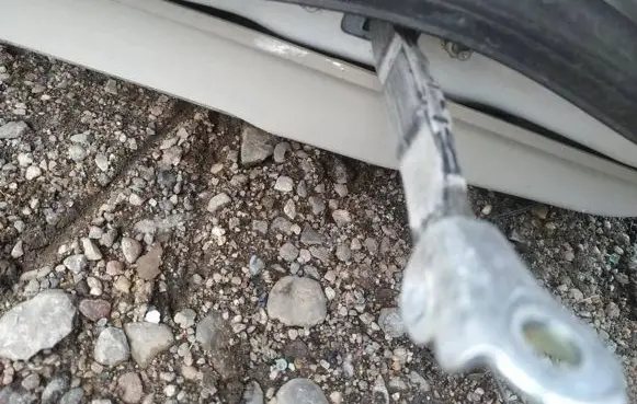 Subaru Legacy Rear door check strap stopper