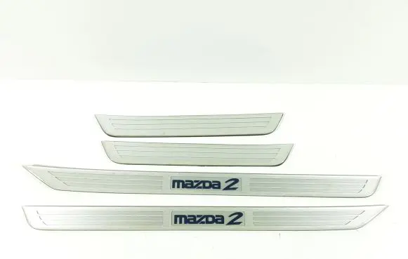 Mazda 2 sill trim set (inner) 