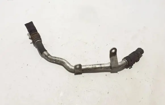 Volkswagen Touareg II Engine coolant pipe/hose 057121064B