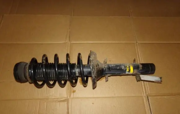 Volkswagen Golf IV Front shock absorber with coil spring
