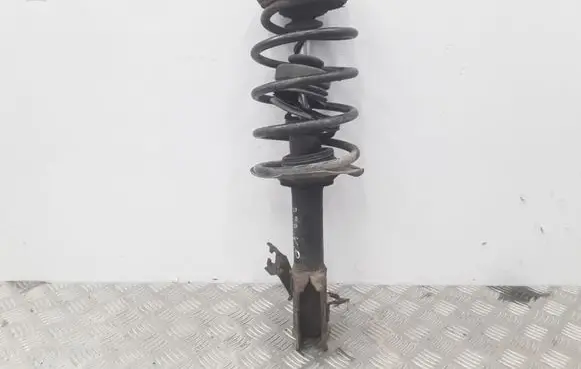 Nissan Almera N16 Front shock absorber with coil spring