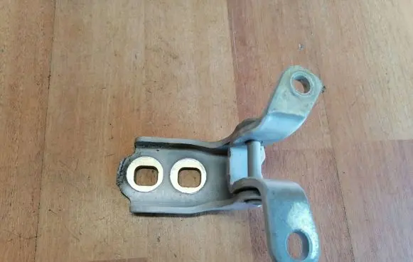 Front door lower hinge