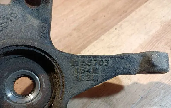 Opel Corsa D Front wheel hub spindle knuckle 55703154