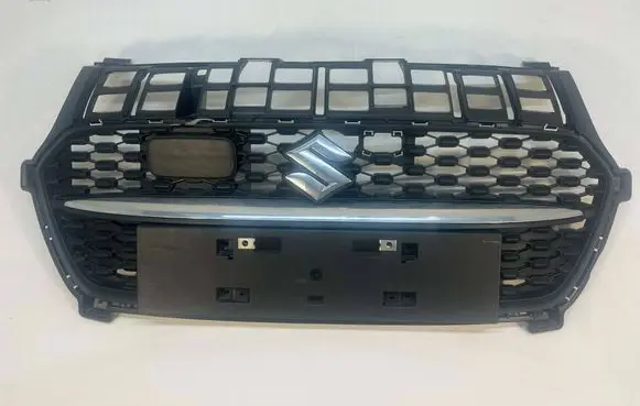 Suzuki Swift III Front bumper upper radiator grill 7174179S0