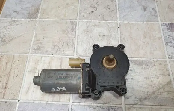 Front door window regulator motor