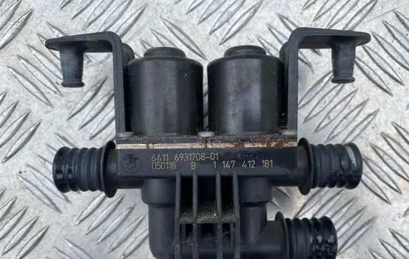 Coolant heater control valve