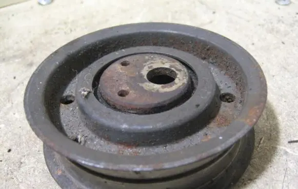 Renault Laguna I Alternator belt tensioner pulley 