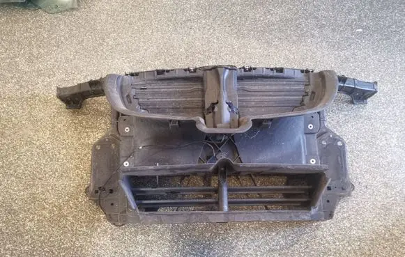Radiator support slam panel