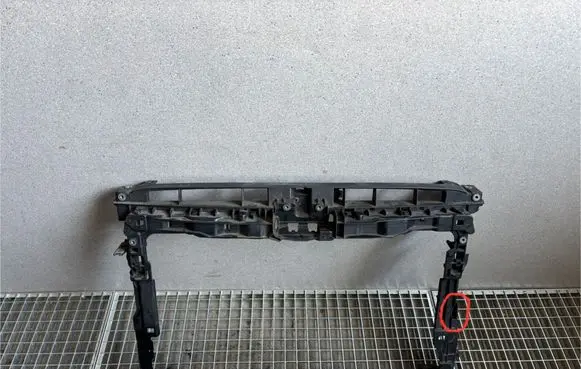 Radiator support slam panel bracket