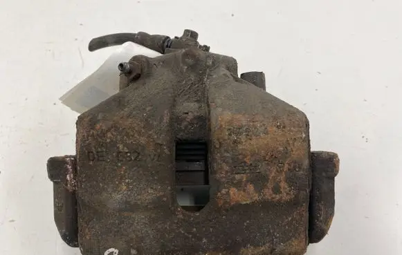 Volkswagen Touran I Front brake caliper 1K0615124E 1K0615124