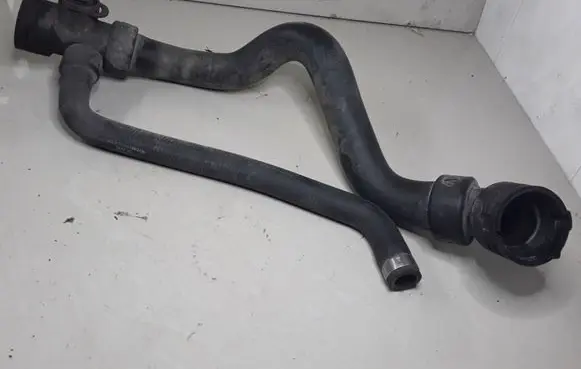 Volkswagen PASSAT B5 Engine coolant pipe/hose 8D0121049H