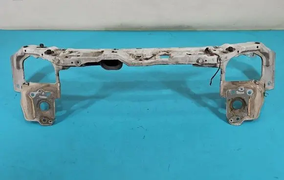 Radiator support slam panel