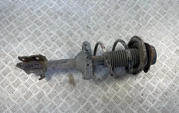 Front shock absorber with coil spring