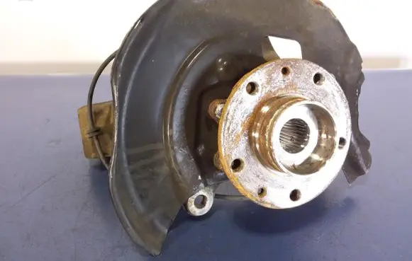 Front wheel hub spindle knuckle