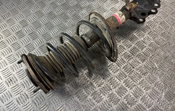 Front shock absorber with coil spring