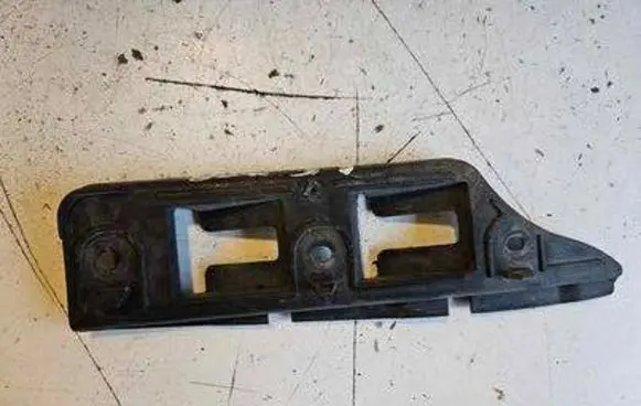 Volkswagen Golf V Front bumper mounting bracket 1KO807184