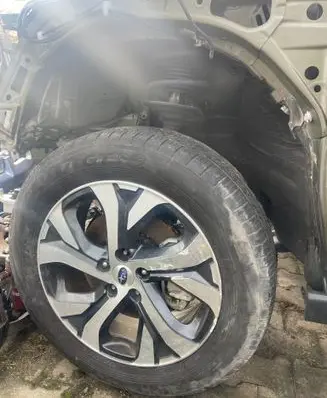 Front shock absorber with coil spring