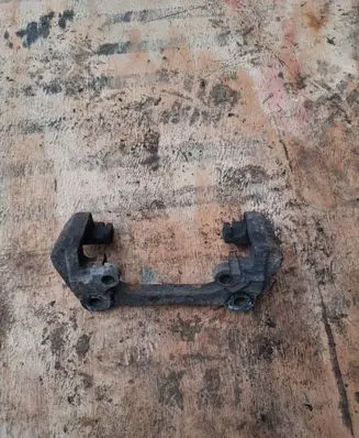 Volvo V70 Front Brake Caliper Pad/Carrier 