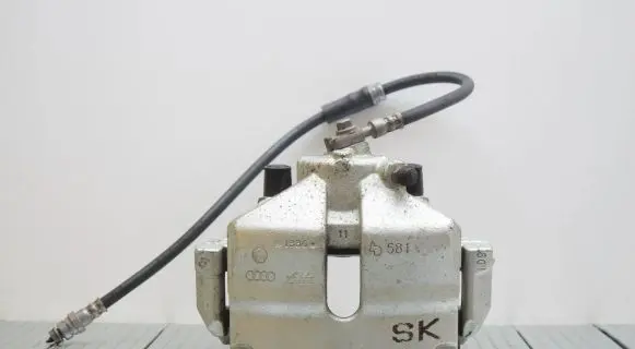 Volkswagen Jetta VI Front brake caliper