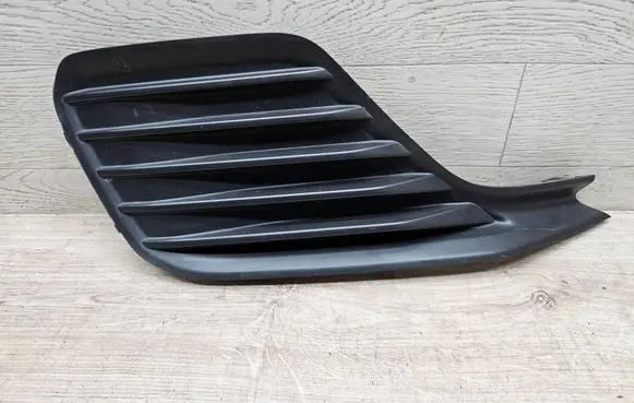 Suzuki Swift III Front fog light trim/grill 7175152R0