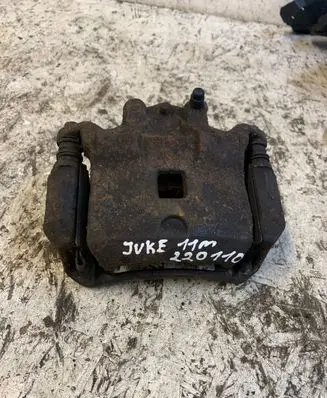 Nissan Juke I F15 Front brake caliper