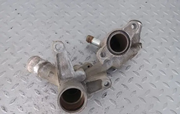 Thermostat/thermostat housing